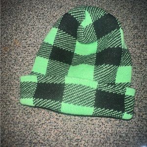 Knitted black and green checkered beanie